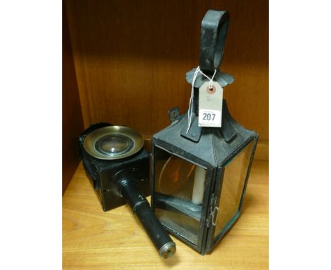 Old black and glass metal lantern and a black painted carriage lamp 