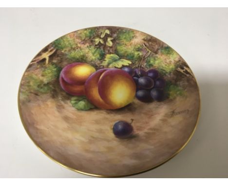 A Quality Royal Worcester hand painted porcelain plate with fruit within a wooded landscape signed Freeman. John Freeman begu