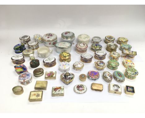 A collection of porcelain and enamel patch boxes.