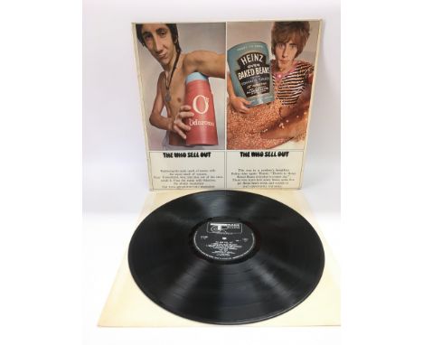 A first UK pressing of 'The Who Sell Out' 612 002, scratches on both sides.