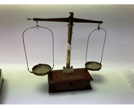 Vintage set of beam scales by backers and sons of Rotterdam, with weights
