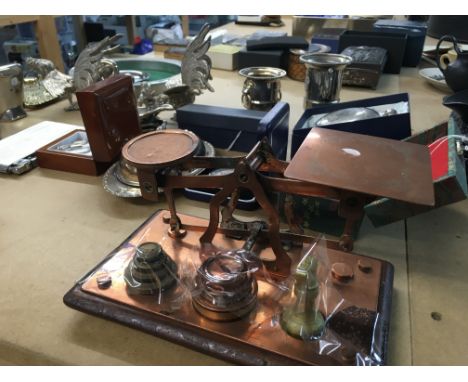 A set of postal scales together with a collection of plated ware including hip flask birds trays, cigarette case .