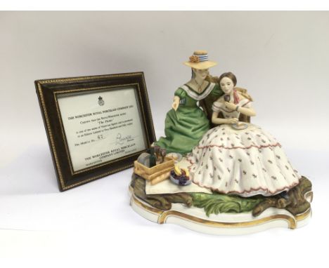 A limited edition Royal Worcester figural group titled The Picnic, number 67/250. Approx height 16cm.