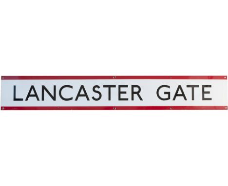 London Underground enamel frieze sign LANCASTER GATE measuring 57in x 9in. In very good condition with minor edge chipping.