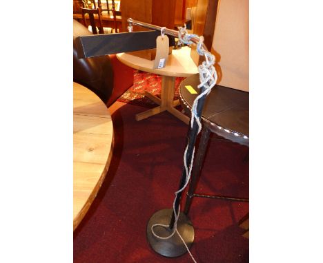 A retro industrial style floor standing lamp by Remington Rand 