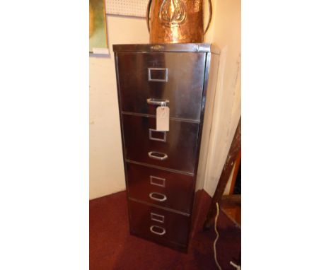 A vintage Art Metal polished steel four drawers filing cabinet