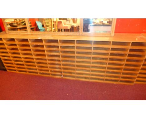 A vintage pigeon hole unit of large proportions 