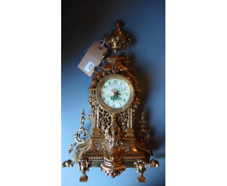 A French style gilt metal mantel clock with urn form surmount 