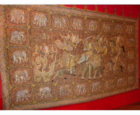 A large Eastern silk embroided wall tapestry with sequin detail 