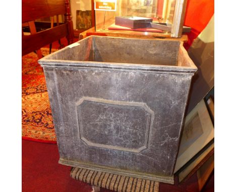 A large lead planter of cube form 
