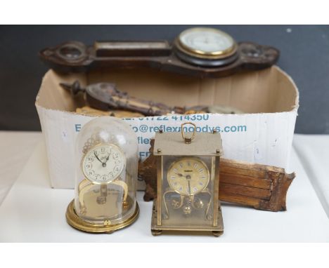 A box of vintage clocks and barometers to include a Anniversary clock and carriage clock. 