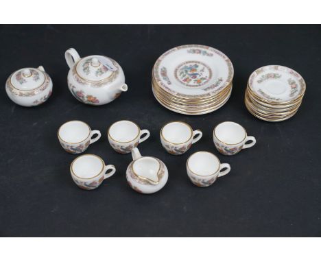 A Wedgwood miniature tea set to include teapot, sugar bowl, milk jug, 6 x cups, 6 x saucers and 6 x plates. 