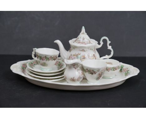 A Royal Doulton Brambly Hedge miniature tea service to include tray, tea pot, 2 x cups, 2 x plates, 2 x saucers, sugar bowl a