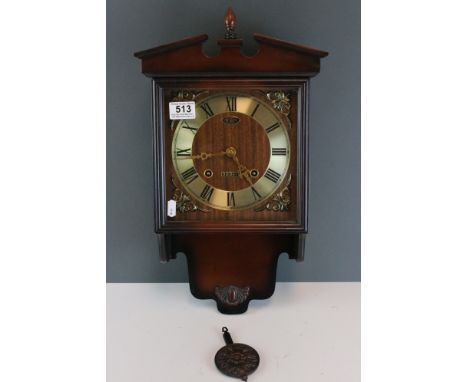 A contemporary President 30 day wooden wall clock. 
