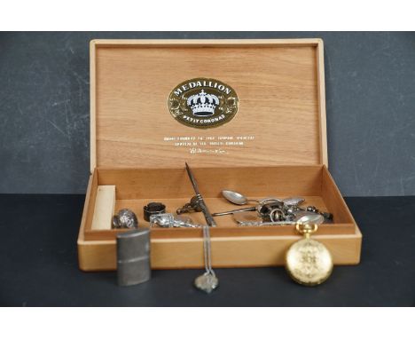 A box of mixed collectables to include watch fobs, hallmarked silver button hooks, lighter and a pocket watch. 