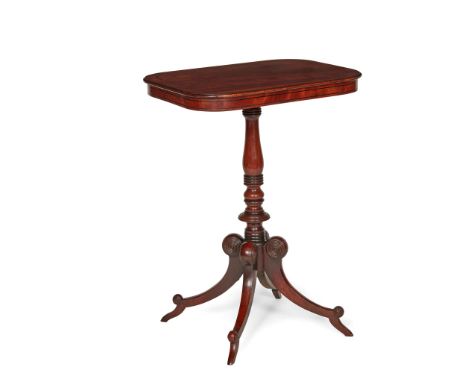 REGENCY PLUM PUDDING MAHOGANY AND EBONISED LAMP TABLE EARLY 19TH CENTURY the rectangular top on a ring turned baluster suppor