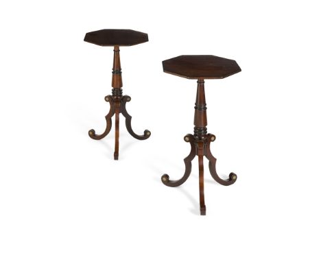PAIR OF REGENCY MAHOGANY AND EBONISED LAMP TABLES EARLY 19TH CENTURY the octagonal tops on tapered ring turned columns and tr
