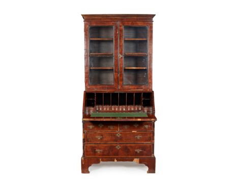 GEORGE II WALNUT BUREAU BOOKCASE 18TH CENTURY the top with a straight moulded cornice above a pair of glazed doors enclosing 