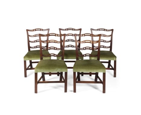 SET OF FIVE GEORGE III MAHOGANY DINING CHAIRS 18TH CENTURY in the Chippendale style, with pierced ladder backs above wide stu