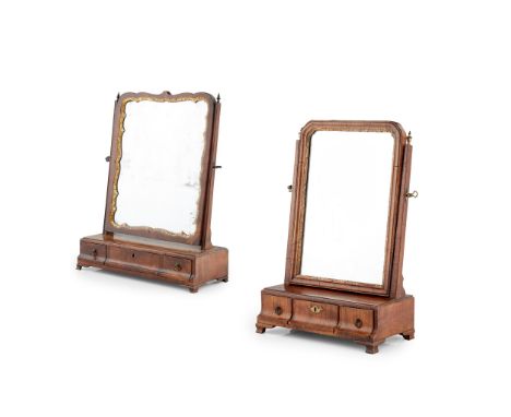 TWO GEORGIAN TOILET MIRRORS 18TH CENTURY the first of mahogany with a shaped mirror plate in a moulded gilt slip, above three