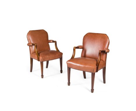 PAIR OF LEATHER UPHOLSTERED MAHOGANY OPEN ARMCHAIRS 20TH CENTURY in the Georgian style, the rounded arch backs above wide sea