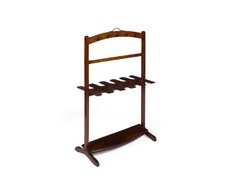 MAHOGANY BOOT AND WHIP STAND 19TH CENTURY with pegs and dividers for boots, and a brass handle(64cm wide, 102cm high, 31cm de