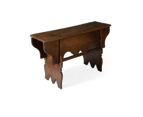 OAK BOARDED BENCH 17TH CENTURY the single board top on bracket supports and scroll cut shaped ends joined by a moulded mid-st