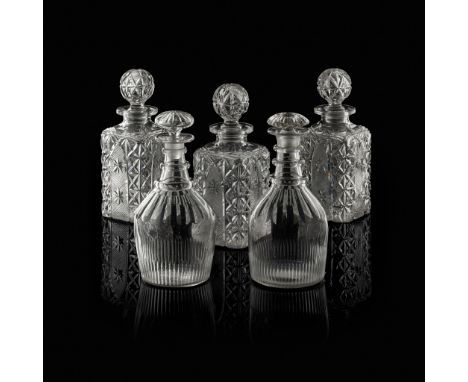 SET OF THREE CUT GLASS SQUARE DECANTERS 19TH CENTURY each side cut with an arched panel with two stars, with hollow ball diam