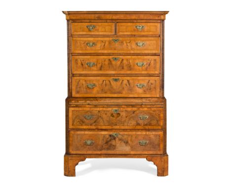 GEORGE II WALNUT CHEST-ON-CHEST EARLY 18TH CENTURY the moulded cornice above a pair of crossbanded short drawers over three f