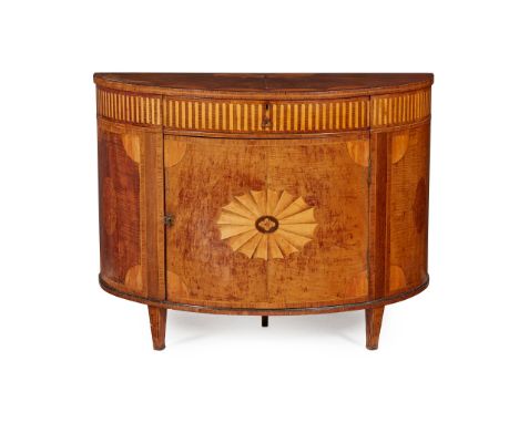GEORGE III HAREWOOD AND SATINWOOD DEMI-LUNE COMMODE LATE 18TH CENTURY the demi lune top with fan inlay above a frieze drawer 
