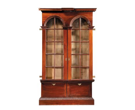 LATE GEORGE II MAHOGANY LIBRARY BOOKCASE MID 18TH CENTURY the egg and dart moulded breakfront cornice above a pair of astraga