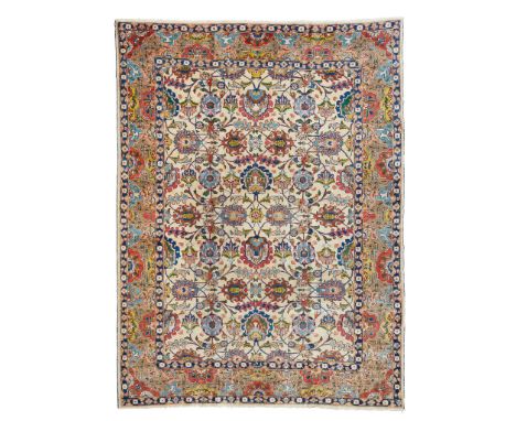 TABRIZ 'NARVANI' CARPET NORTHWEST PERSIA, MID 20TH CENTURY the light camel field with allover palmette and vine pattern, with