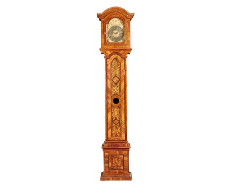 GERMAN MARQUETRY LONGCASE CLOCK 18TH CENTURY the embossed arched brass dial with a Roman numeral chapter, above a long door w