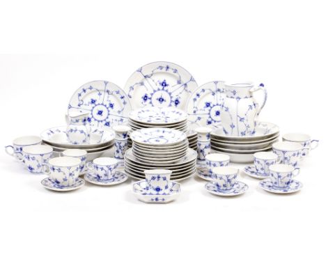 A PART ROYAL COPENHAGEN TEA AND DINNER SERVICE  with blue and white plates, jugs, cups etc (a quantity)
