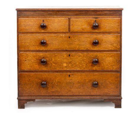 A VICTORIAN OAK CHEST OF TWO SHORT AND THREE LONG DRAWERS with turned knob handles, 114cm wide x 52cm deep x 107cm high