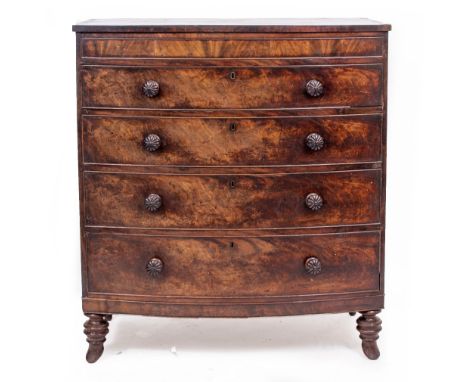 A VICTORIAN MAHOGANY BOWFRONT CHEST OF FOUR LONG DRAWERS with turned wooden handles standing on splayed legs, 112cm wide x 57