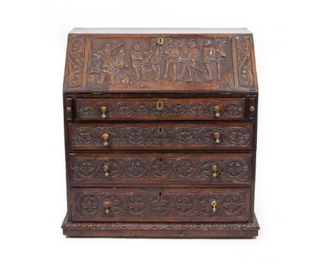 AN ANTIQUE OAK BUREAU with a scene of Francis Drake playing bowls to the front, the fall front enclosing a fitted interior ov