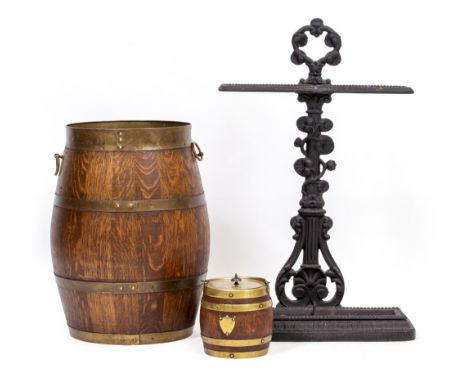 A 20TH CENTURY COOPERED BLACK STICK STAND, 44cm x 17cm x 68cm, an oak basket with brass banded exterior, 33cm x 46cm and a fu