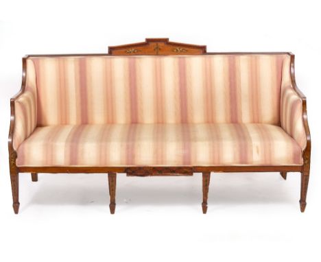 AN ANTIQUE TWO SEATER SOFA with a striped upholstered seat, penwork and painted decoration to the supports and legs, 172cm wi