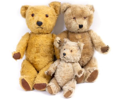 THREE VINTAGE TEDDY BEARS possibly Chad Valley, does not bear labels or tags, the largest 46cm high, the smallest 29cm high o