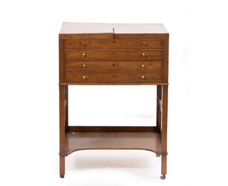 A 19TH CENTURY DRESSING CHEST  with cross banded decoration, fitted with two faux drawers over two fitted drawers with straig