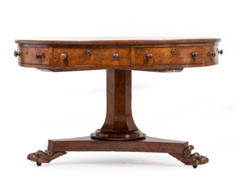 A 19TH CENTURY DRUM TABLE with a segmented oak veneered top and a burr walnut veneered body, having four frieze drawers and f