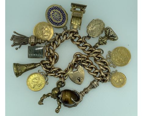 9CT GOLD CHARM BRACELET WITH 15CT GOLD PADLOCK CLASP &amp; 13 CHARMS including a folded up one pound note in 9ct gold box ins