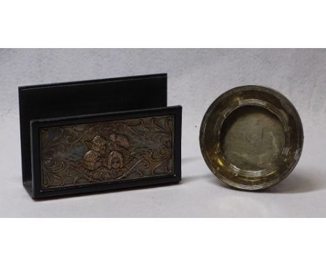 SILVER MOUNTED LETTER RACK and a circular portrait frame, the rack in leather covered metal with embossed silver panel to the