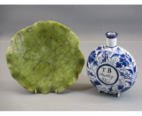 CARVED ONYX TYPE STONEWARE DISH and a delftware circular flask inscribed to the front 'T B Audley 1831'