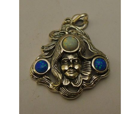 A silver Art Nouveau style opal pendant