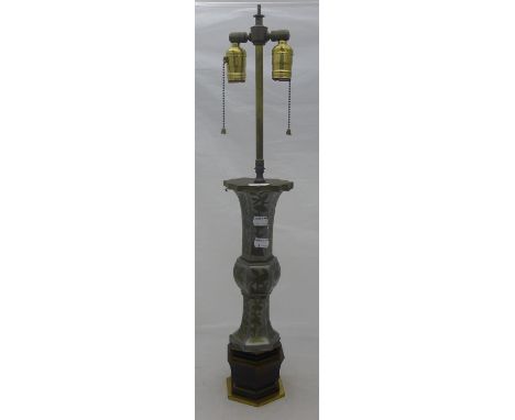 A Chinese pewter lamp
