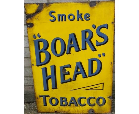 A 'Smoke BOAR'S HEAD Tobacco' enamel advertising sign