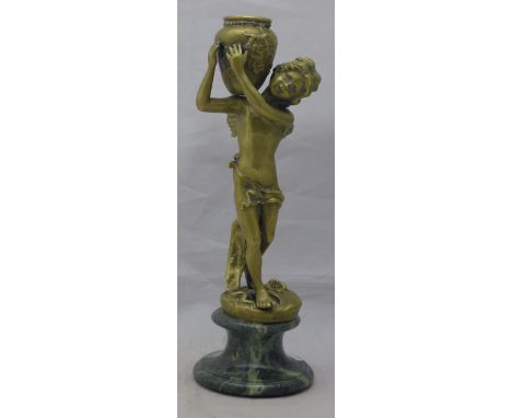 A bronze figural candlestick