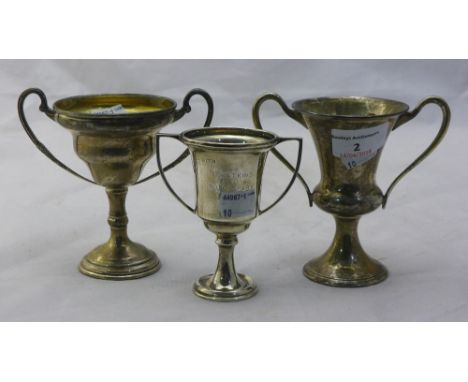 Three small silver trophy cups (265 grammes)